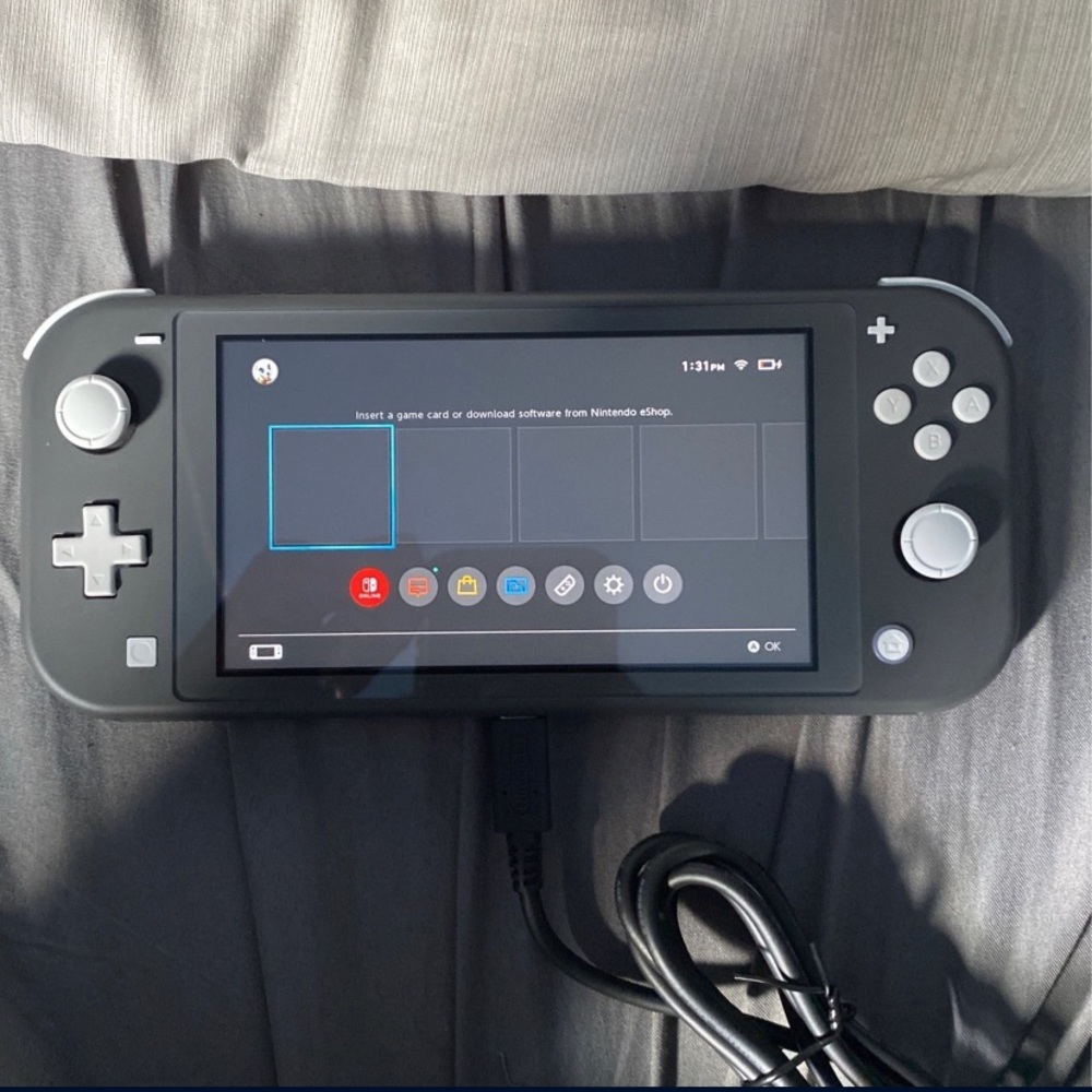 nintendo switch basically new, used once must go